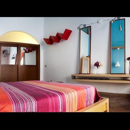 تْشيفالو B&B La Rocca الغرفة الصورة